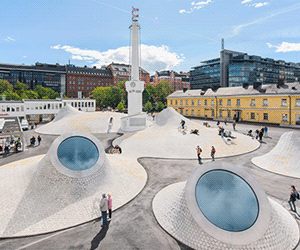Современный музей в здании бывшего автовокзала. JKMM Architects меняет городской ландшафт Хельсинки