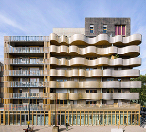 Волнистые балконы длиной в целый этаж. Как парижские фасады преображаются перед Олимпиадой 2024